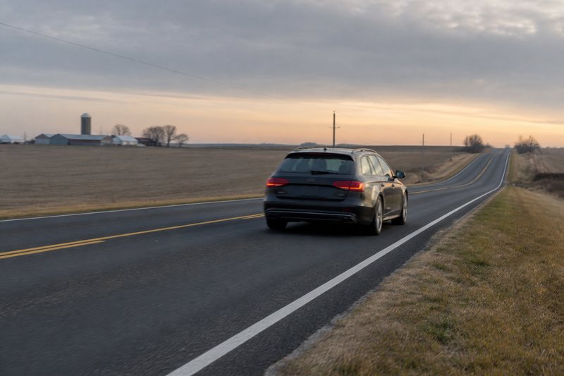 Unbranded premium sedan on a quiet Midwestern test drive
